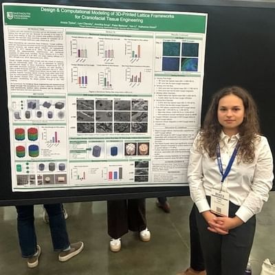 Anisia Tiplea with her research poster