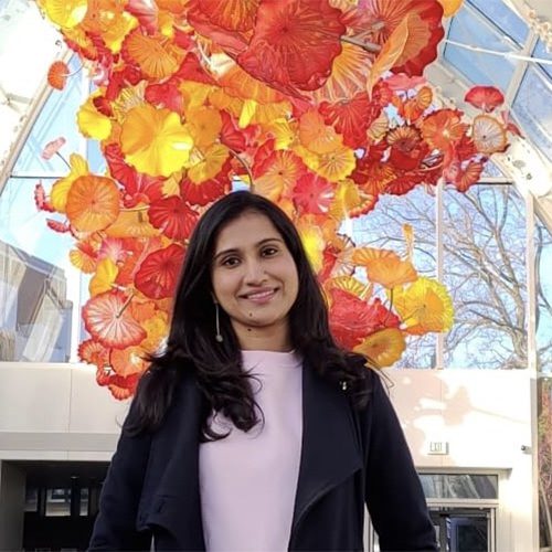 Bala Sahitya Vadlamani in front of the company she works at