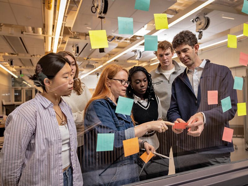 Professor Sol Diamond, CEDC Director Emily Monroe, DIAD's Paula Olson, and students.