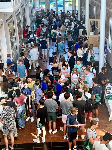 Students gathered in the atrium for Fall Orientation.