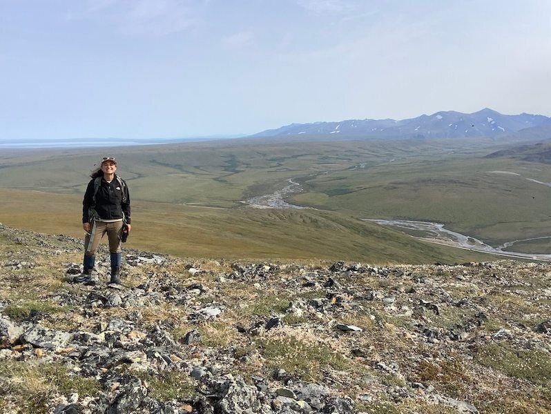 Joanmarie Delvecchio stand atop permafrost in study of Arctic