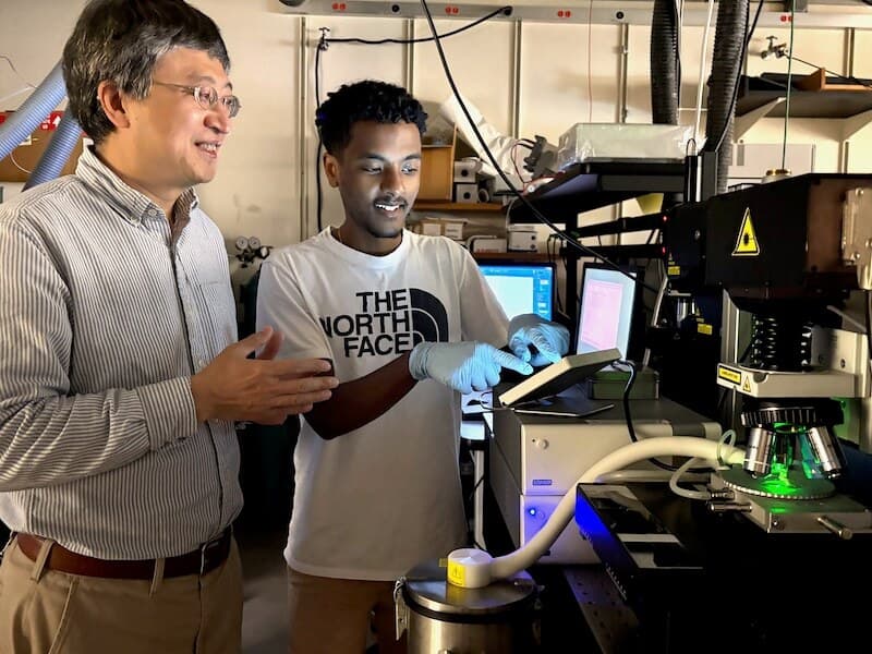Professor Jifeng Liu and Gideon Kassa in lab