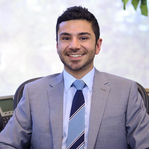 Mani Alaei at his desk