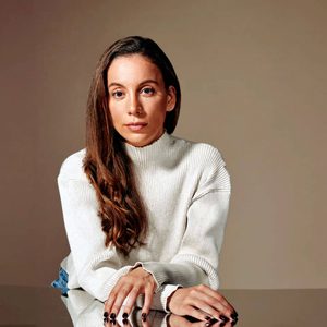 Mira Murati with white sweater