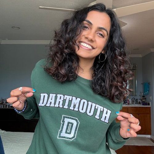 Naisha Sinha shows off her Dartmouth sweatshirt