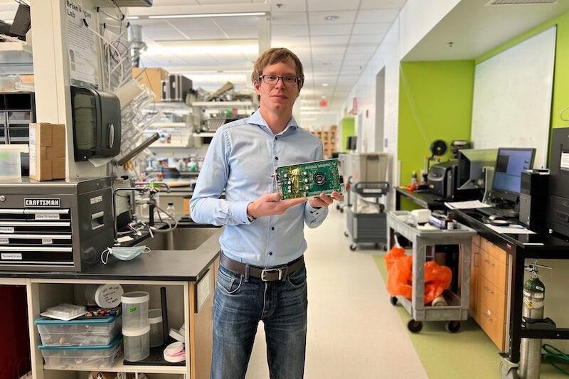 petr bruza holds camera