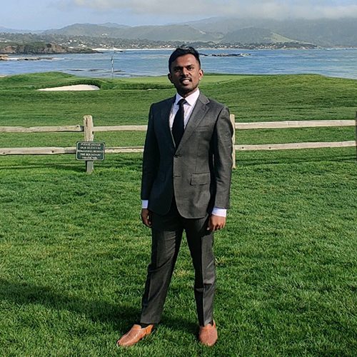 Satish Nathan outside by the water