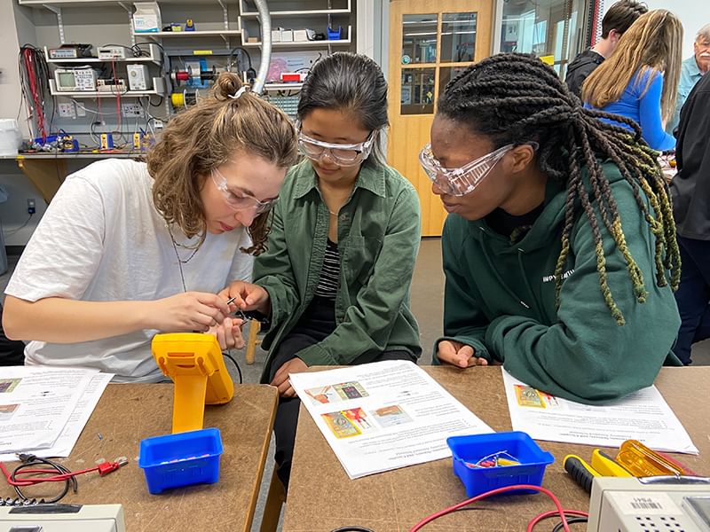 Students in ENGS 21: Introduction to Engineering make a simple circuit and learn how to solder wires.